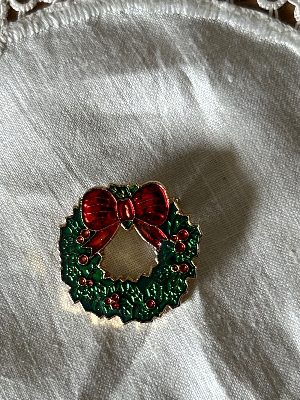 Festive Enamel Christmas Wreath Pin with Red Bow